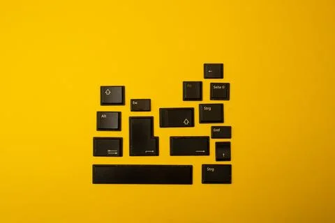 Buttons from a computer on a yellow background Stock Photos