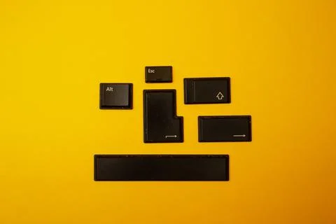 Buttons from a computer on a yellow background Stock Photos