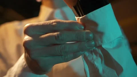 The buttons on the cuffs of shirt Stock Footage 168515801