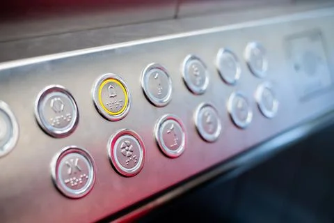 Buttons in the elevator with Braille code for blind people Foto stock