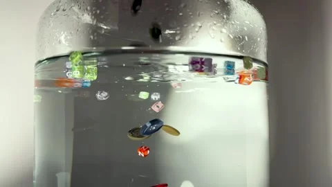 Buttons fall in the water Stock Footage 257481080