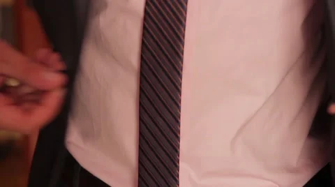 Buttons his jacket Stock Footage 62022896