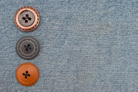 Buttons on jeans Stock Photos