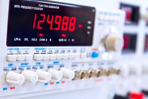 Buttons of laboratory function generator with frequency counter Stock Photos