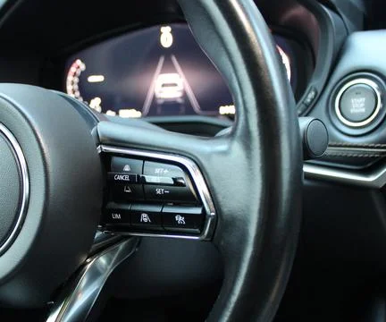 Buttons on a Multifunctional Steering Wheel of Modern Car Stock Photos