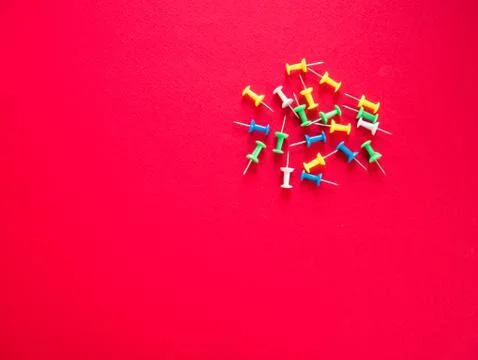 Buttons with needles on red copy space Stock Photos