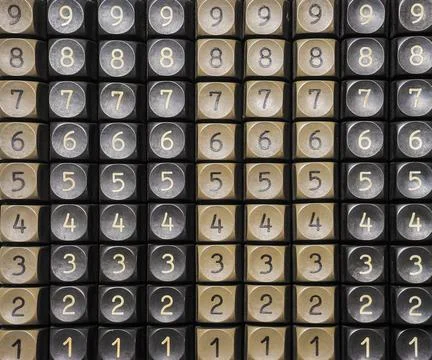 Buttons of old computing device with sequence of numbers and digits. Solid Foto stock