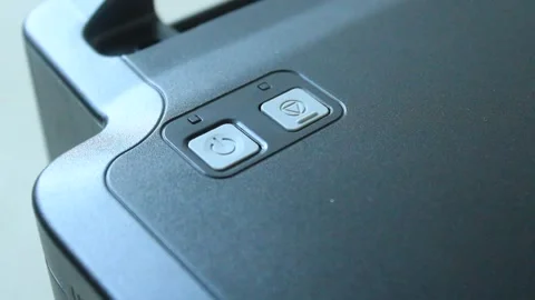 Buttons on the printer. printer power button. printer reset button Stock Footage 334647289