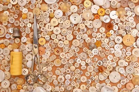 Buttons, scissors, thimble Stock Photos