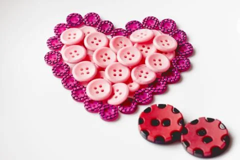 Buttons in shape of heart Foto stock
