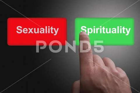Buttons with written Spirituality and Sexuality and pointing finger, on a gra Stock Photos
