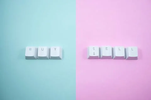 Buy and sell button on computer keyboard keys Stock Photos