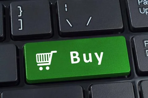 Buy button computer keyboard with trolley icon. Buy button computer keyboa... Stock Photos