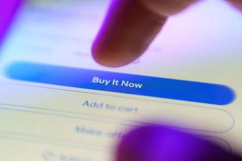 Buy it now button on Ebay e-shop website. E-commerce concept Stock Photos