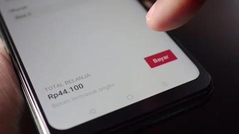 Buy now button on smartphone screen red Order Confirmed Stock Footage 293999141