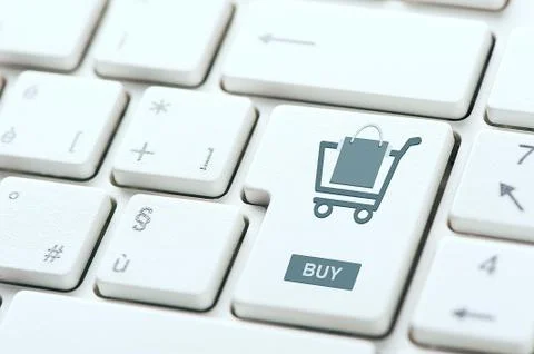 Buy now concepts, with message on computer keyboard Stock Photos