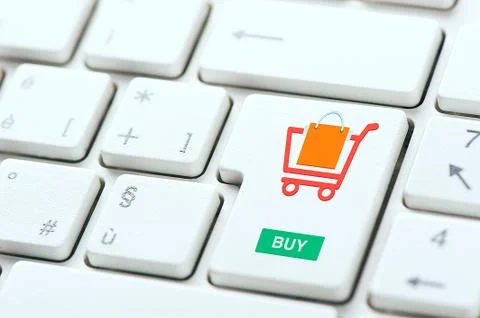 Buy now concepts, with message on computer keyboard Stock Photos