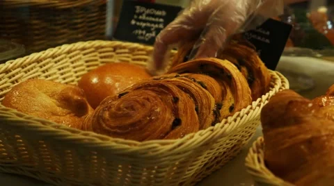 Buying baked bread in a bakery window display Stock Footage 60697307