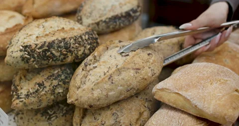 Buying bread at the store. Stock Footage 148104999