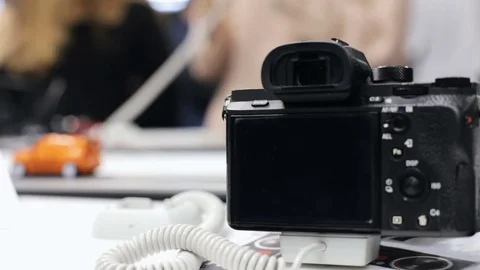 Buying a camera in the store Stock Footage 85184253