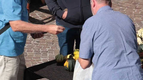 Buying decorative pumpkins Stock Footage 96157809