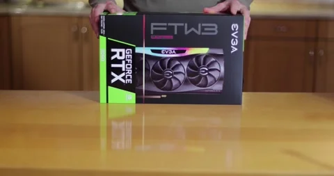 Buying EVGA Geforce RTX 3090 Nvidia GPU in a shop Stock Footage 149208232