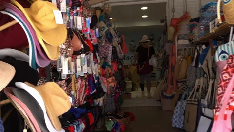 Buying a hat Stock Footage 244864038