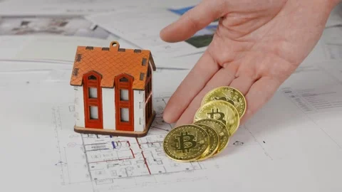 Buying a house with bitcoins Stock Footage 305637280