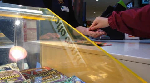 Buying lottery ticket Stock Footage 38847916