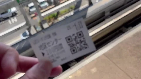 Buying a QR Code Ticket and Riding a Modern Monorail - Tokyo, Japan, April 2025 Stock Footage 307964343