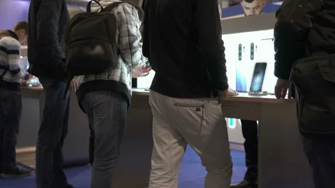 Buying a smartphone in the store Stock Footage 109105120