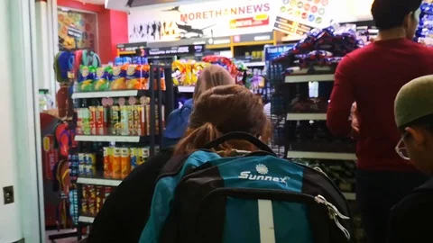 Buying snack in kiosk Stock Footage 107464997