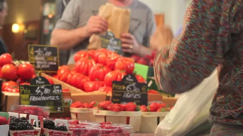 Buying tomatoes Stock Footage 23706676