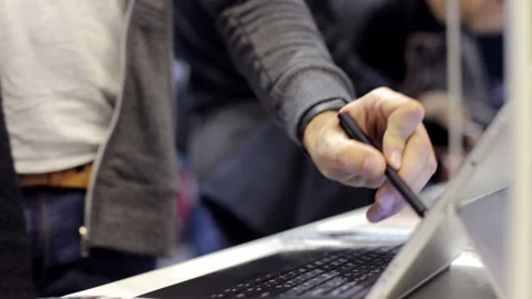 Buying a touch laptop in the store Stock Footage 94604310