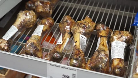 Buys a bone for the dog Stock Footage 260854177