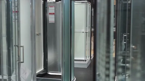 Buys shower stalls in a store Stock Footage 260202429