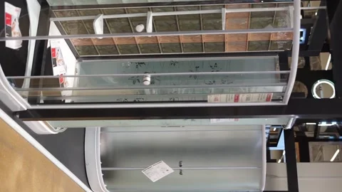 Buys shower stalls in a store vertical video Stock Footage 260202469