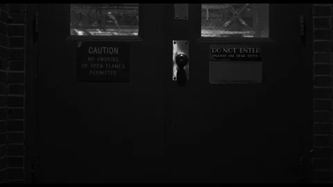BW Basement Door - Caution - Do Not Enter Stock Footage 90236996