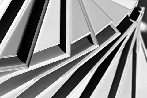 B&amp;W close-up of spiral stack of books Stock Photos