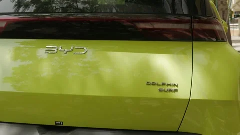 BYD Dolphin Surf Logo and Model Badge on Electric Car Stock Footage 340210711