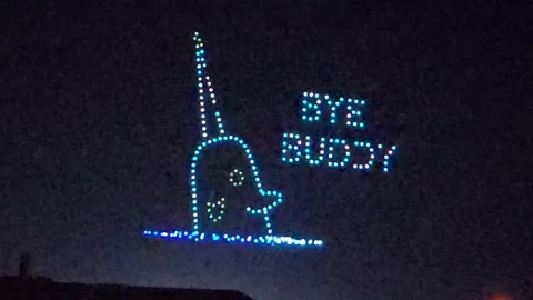 Bye Buddy Narwhal scene from Elf movie depicted by aerial drone show 動画素材 257386931