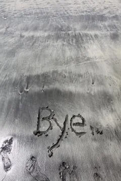 Bye on sand Stock Photos