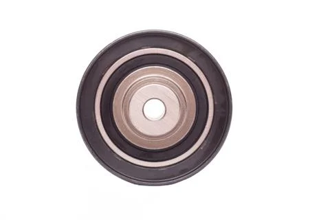Bypass automobile roller timing system engine, white background, close-up Fotos de archivo