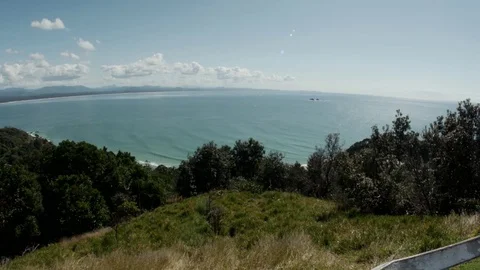Byron Bay Lighthouse Pan Bay to Ocean Stock Footage 84877149