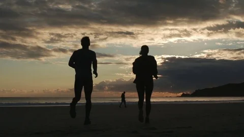 Byron Bay Main Beach Sunrise Beach Run SLOMO 1 Stock Footage 84875352