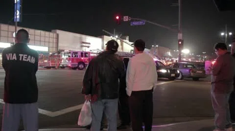 Bystanders watch firefighters at Work Video stock 10735943