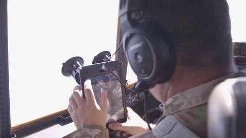 C-130 Hercules pilot using in flight touchscreen computer Vídeos de archivo 97261463