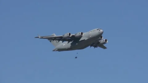 C-17 Globemaster parachute drop at the Arctic Thunder Airshow - Open House 2014 Stock Footage 41729045