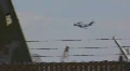 C-17 maneuvers - 16 - coming in behind airplane junk yard Video HD