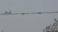 C-17 maneuvers - 19 - turning behind antenna tower HD Footage
